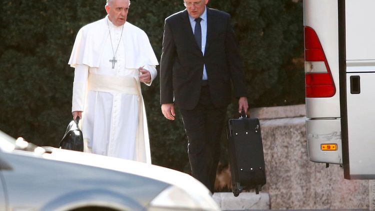 Vatican security chief, papal bodyguard, steps down over leak