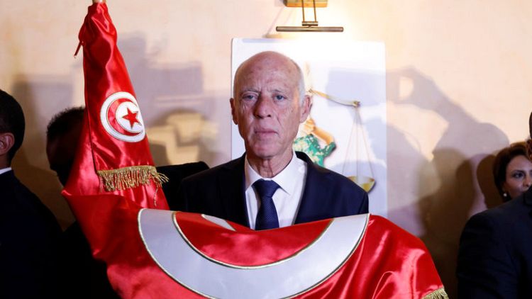 New Tunisian leader rode wave of youth excitement to presidency