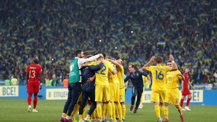 Ukraine reach Euro 2020 as Ronaldo hits milestone