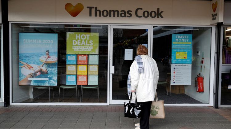 Former Thomas Cook boss defends record, pay after firm's collapse