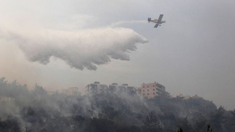 Lebanon deploys water cannon, helicopters to fight wildfires across country