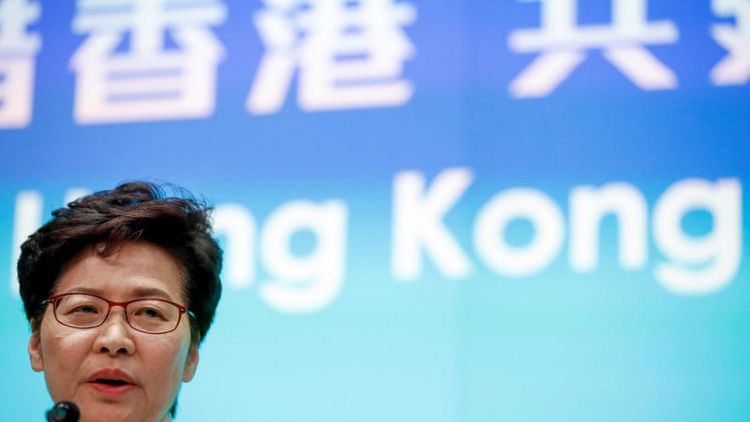 Hong Kong leader forced to abandon address, offers no olive branch