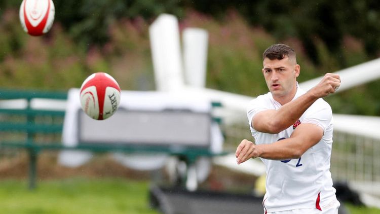 England winger May marks 50th cap by looking back on luck and focus
