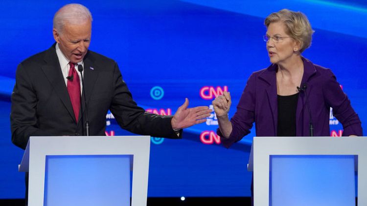 U.S. Democrats back on 2020 campaign trail after debate attacks on Warren