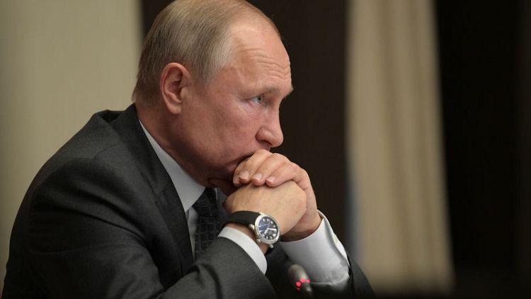 Russia's Putin revokes Geneva convention protocol on war crimes victims