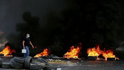 Protests sweep Lebanon as fury at ruling elite grows over economic corruption Protests sweep Lebanon as fury at ruling elite grows over economic corruption