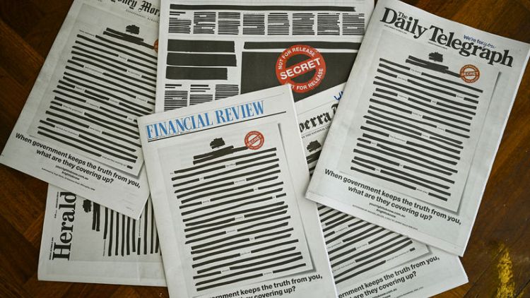 Australian newspapers redact front pages to protest media curbs