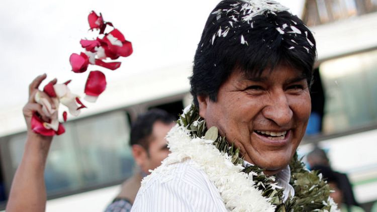 Bolivia's Morales leads election after quick count; second round looks likely