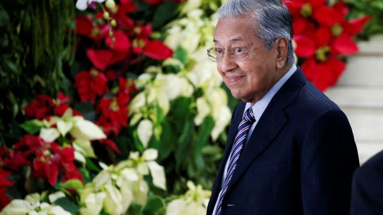 Mahathir warns of possible trade sanctions on Malaysia