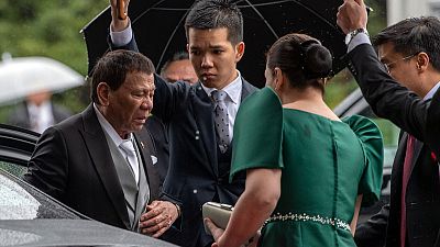 'Unbearable pain' cuts short Philippine leader's Japan trip 'Unbearable pain' cuts short Philippine leader's Japan trip
