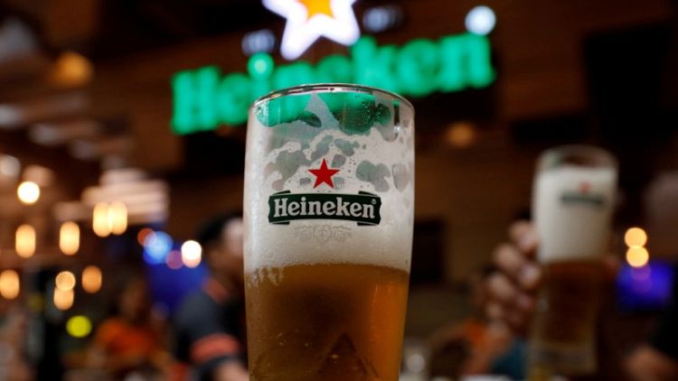 Brewer Heineken tempers profit hopes as Americas slip