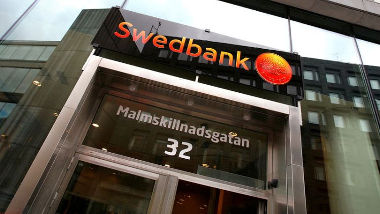 Swedbank third-quarter profit squeezed by costs for money-laundering fall-out