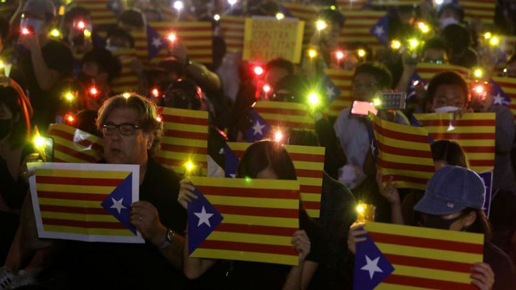 Hong Kong pro-democracy protesters rally for Catalan separatists