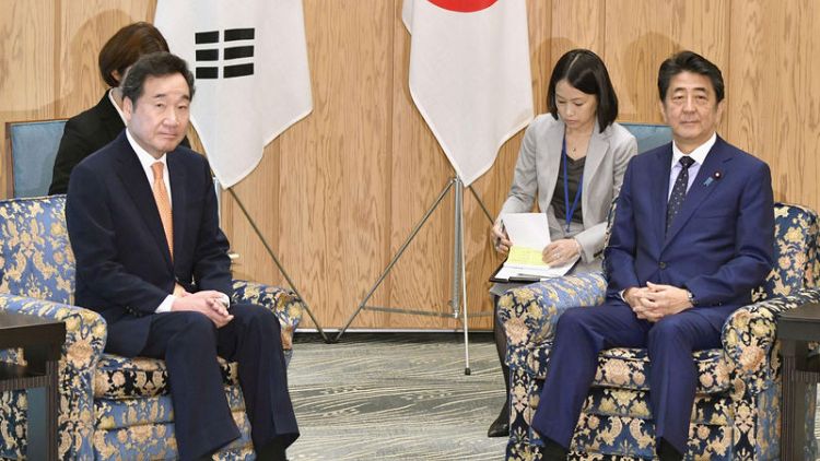 Japan's Abe tells South Korea's Lee cooperation is key on North Korea