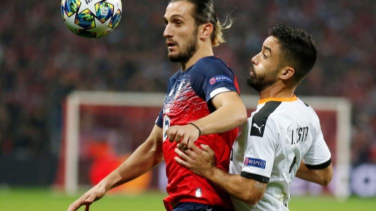 Ikone's late goal gives Lille 1-1 draw with Valencia