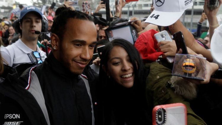 Hamilton says he is trying hard to reduce carbon footprint