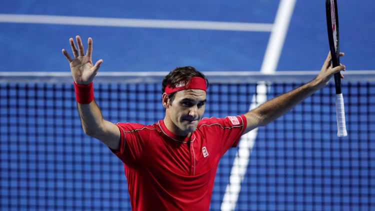 Federer ousts Tsitsipas in Basel semis for 50th win of the season