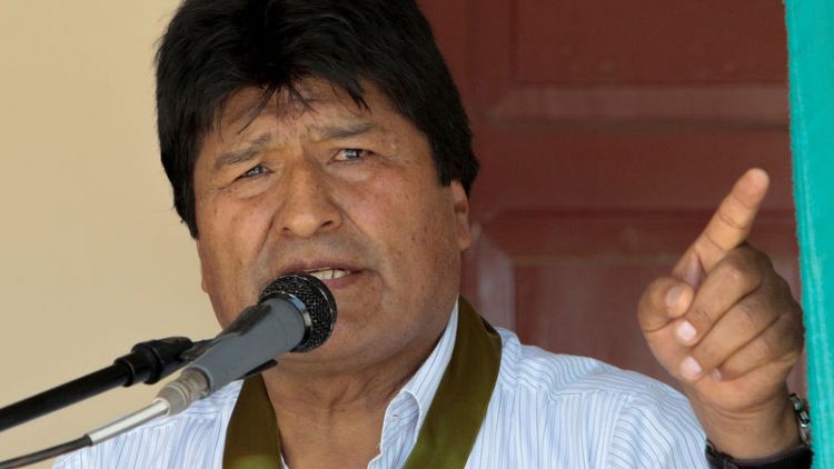 Bolivia's Morales vows second-round vote if fraud found in election, threatens siege of cities