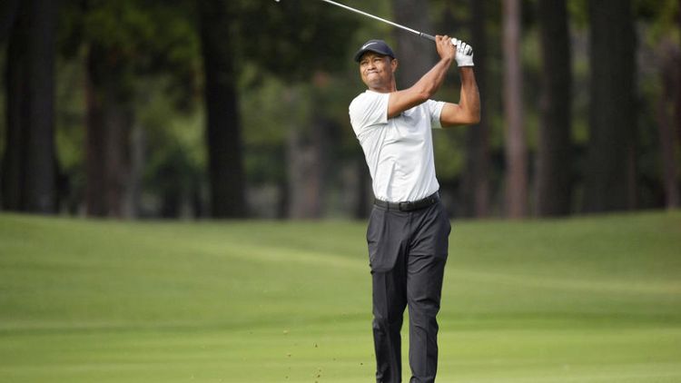 Woods builds three-shot lead over Matsuyama after third round