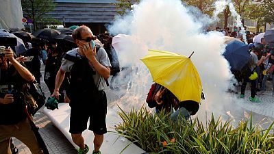 Hong Kong protesters, police in dusk standoff after tear gas breaks up rally Hong Kong protesters, police in dusk standoff after tear gas breaks up rally