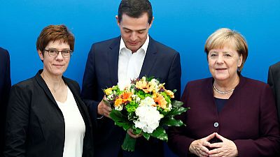 German conservative leader faces rebellion after election trouncing German conservative leader faces rebellion after election trouncing