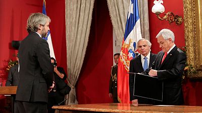 Chile Pinera faces new protests after firing ministers, courting working class Chile Pinera faces new protests after firing ministers, courting working class