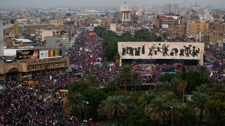 Iraqi protesters pack Baghdad square, anti-government movement gains momentum