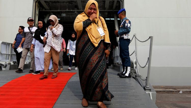 A year on from Lion Air crash, Indonesians pray, scatter petals for victims