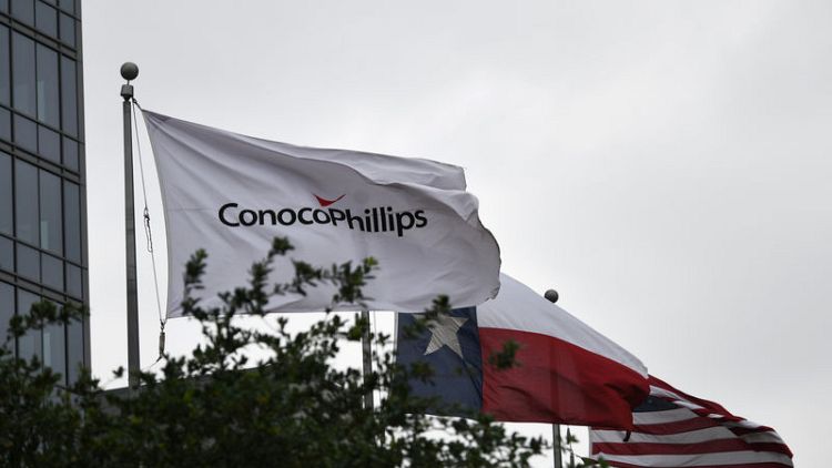 ConocoPhillips profit slumps 43% on lower oil prices, higher costs