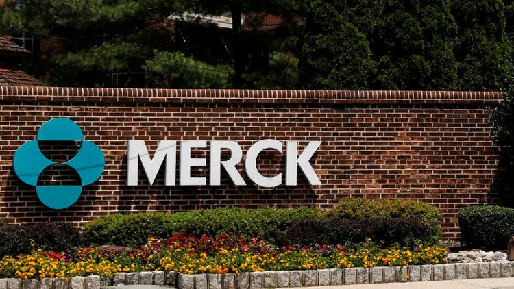 Merck quarterly profit falls on deal-related charge