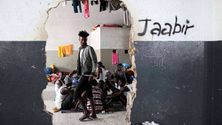 Migrants released amid fighting in Libyan capital seek refuge with U.N.
