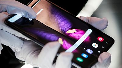 Samsung Electronics shows off new design for square-folding phone Samsung Electronics shows off new design for square-folding phone