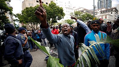 South African police arrest 100 people in protest against xenophobia South African police arrest 100 people in protest against xenophobia