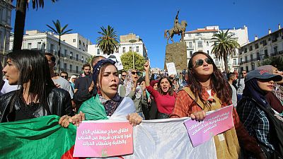 Algerian protesters march on in defiance of 'The Power' Algerian protesters march on in defiance of 'The Power'
