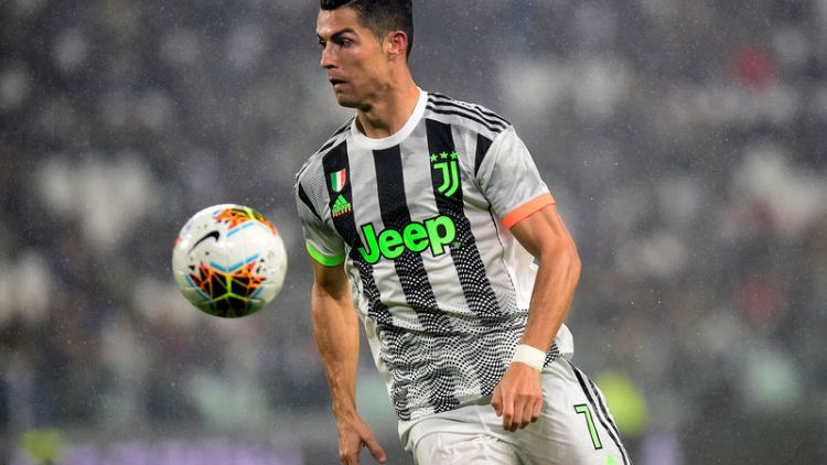 Ronaldo's stoppage time penalty sinks 10-man Genoa