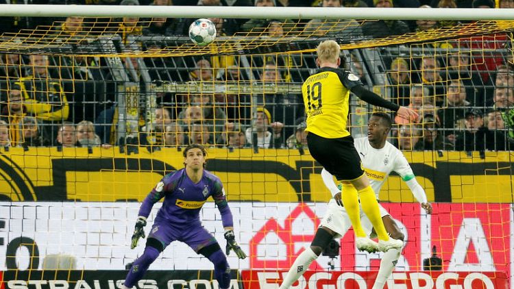 Late Brandt double helps Dortmund beat Gladbach in German Cup