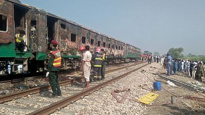 Fire sweeps Pakistani train, killing 73, after cooking fire Fire sweeps Pakistani train, killing 73, after cooking fire