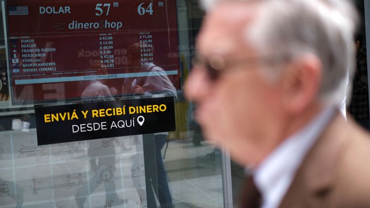 Argentina sets floor under peso as reserves dwindle