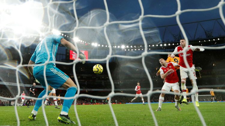 Jimenez header gives Wolves 1-1 draw at Arsenal