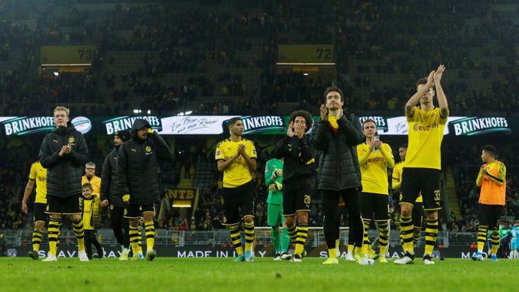 Dortmund snap Wolfsburg's unbeaten run to move into second place