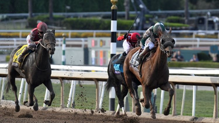 Horse racing - Blue Prize stuns Midnight Bisou in Breeders' Distaff