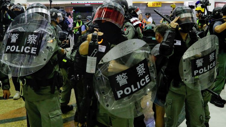 Chinese state media urge 'tougher line' in Hong Kong after Xinhua targeted