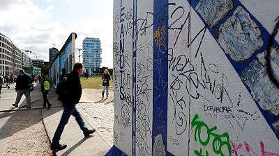 Three decades on, Germans remember surprise fall of Berlin Wall
