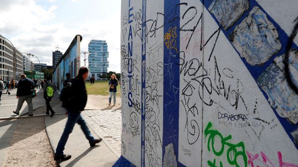 Three decades on, Germans remember surprise fall of Berlin Wall Three decades on, Germans remember surprise fall of Berlin Wall