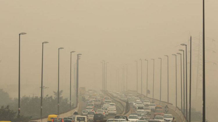 Indian capital banishes some cars in bid to curb hazardous air pollution