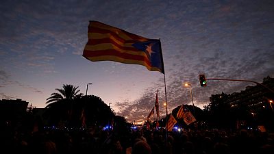 Spanish king greeted with protests in Catalonia