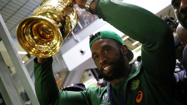 King Kolisi revels in support as thousands welcome Boks home King Kolisi revels in support as thousands welcome Boks home