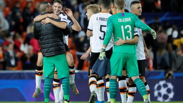 Valencia roar back in second half to thrash Lille Valencia roar back in second half to thrash Lille