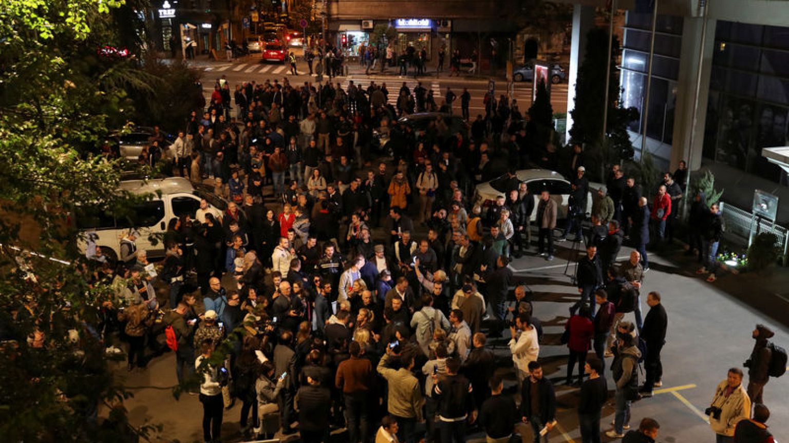 Serbian president forced to use side door at TV studio after protesters block entrance