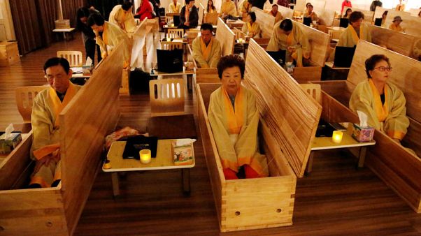 Dying for a better life: South Koreans fake their funerals for life lessons Dying for a better life: South Koreans fake their funerals for life lessons